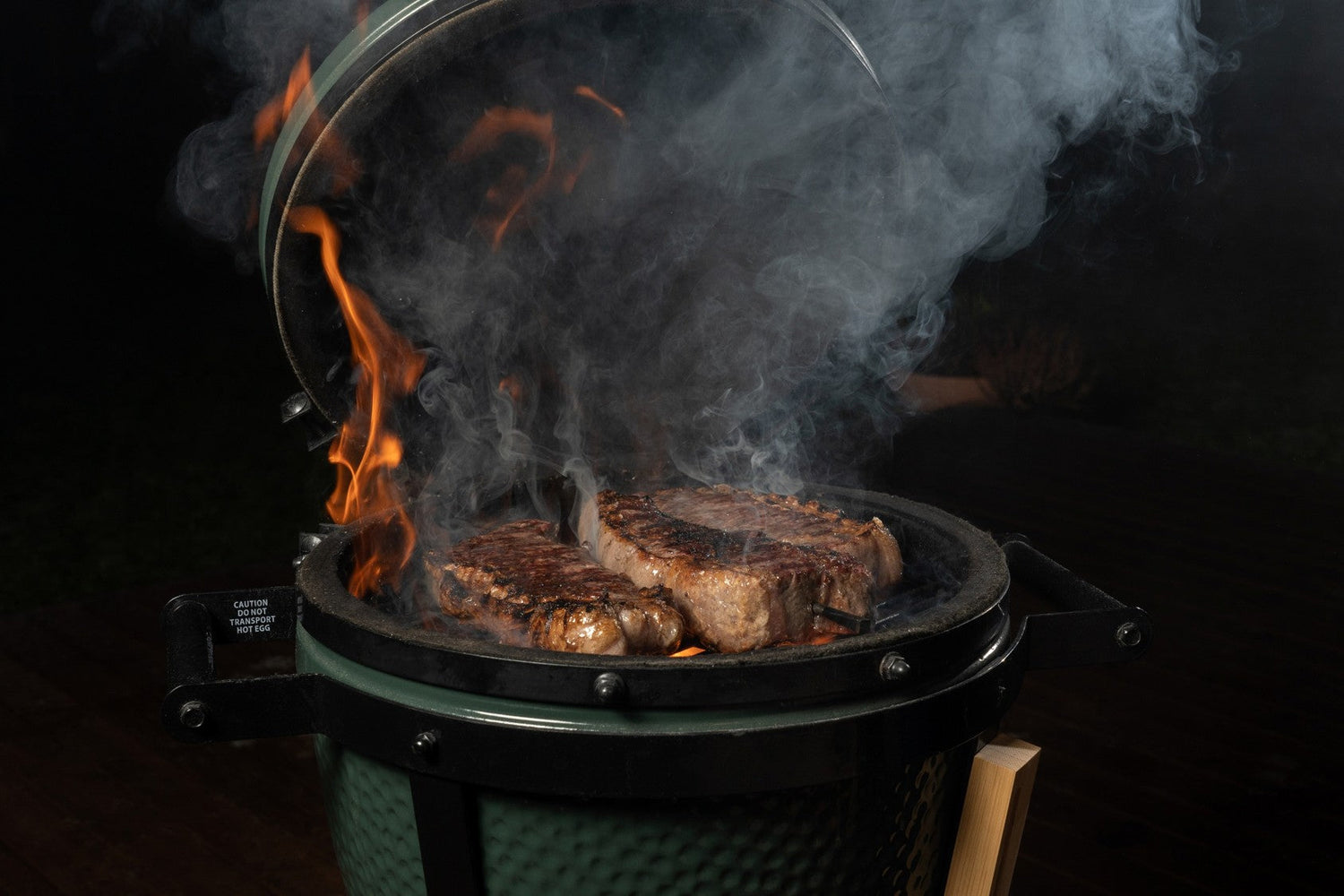 Grilled ribs and smoked meats seasoned with SALTOPIA CABIN FEVER hickory infused sea salt on a summer BBQ grill