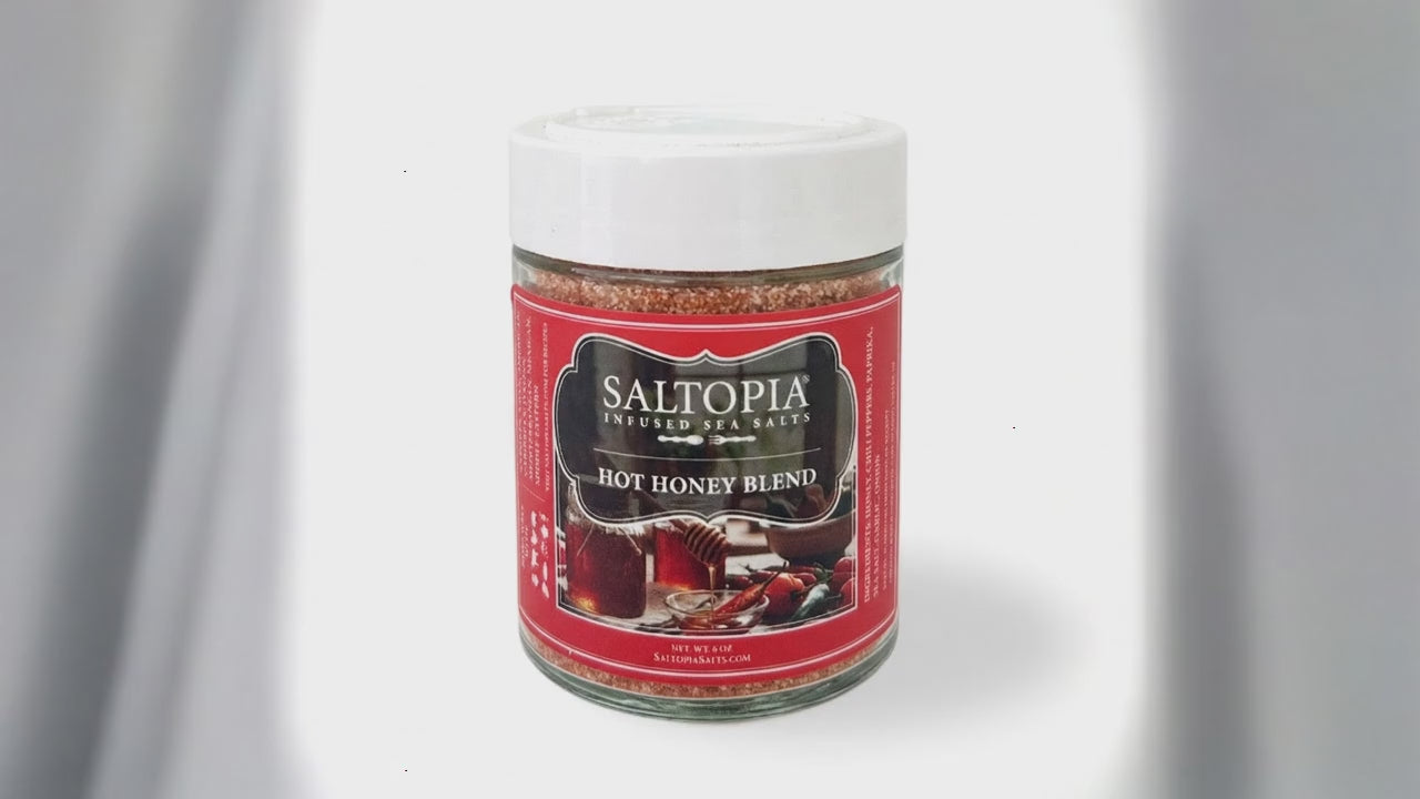 Load video: Hot honey swicy seasoning blend with honey drenched over it from SALTOPIA Salts.
